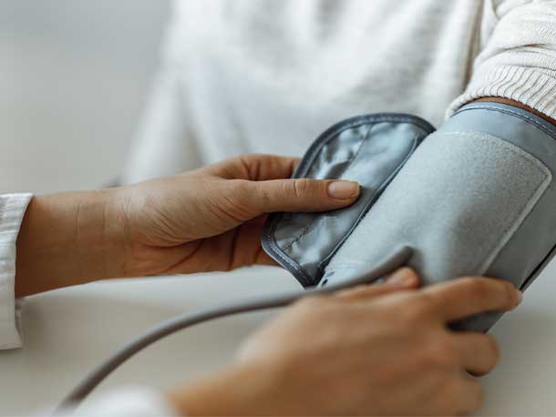 Employee receiving a biometric screening during a preventive health event by HealthFair.com